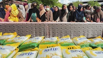 Ilustrasi - Distribusi bantuan beras dari Bapanas akan dimulai segera setelah anggaran tambahan cair, menyasar keluarga penerima manfaat di seluruh Indonesia. (Dok. Ist)
