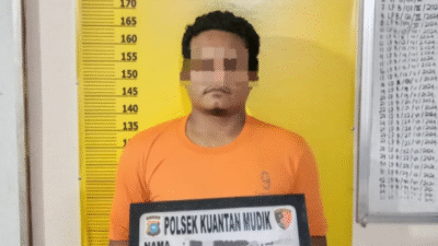 Pelaku berinisial I (28), saat diamankan di Polsek Kuantan Mudik setelah ditangkap dalam operasi penindakan PETI di Kuansing.