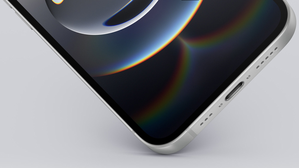 Sebuah smartphone seri iPhone 16 berwarna silver dengan layar menyala diletakkan di atas permukaan putih, menampilkan tampilan antarmuka iOS. (Dok. Apple.com)