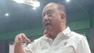 Marciano Norman, Ketua Umum KONI Pusat, sedang menyampaikan pidato pembukaan CDM/DRM PON Bela Diri 2025 di Djarum Supersoccer Arena, Kudus. (Dok. Faktakalbar.id)