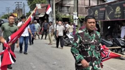 Komandan Korem 011/Lilawangsa, Kolonel Inf Ali Imran (kanan), turun langsung memimpin pasukan untuk menertibkan atribut dan membubarkan massa pengibar bendera Bulan Bintang di Lhokseumawe, Kamis (25/12/2025). (Dok. HO/Faktakalbar.id)