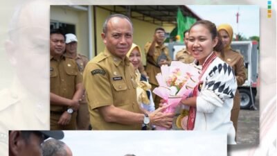 Sekretaris Daerah Kabupaten Ketapang Repalianto menyambut hangat dan mengalungkan bunga kepada Cici Juliani, atlet para tenis meja peraih medali emas Paragames Thailand. (Dok. HO/Faktakalbar.id)