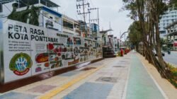 Suasana trotoar di Jalan Teuku Umar yang tertata rapi dengan mural Peta Rasa Kota Pontianak sebagai branding kuliner dan jalur pedestrian yang inklusif. (Dok. HO/Faktakalbar.id)