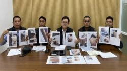 Sejumlah cetakan foto yang memperlihatkan kondisi luka pada tubuh para siswa akibat dugaan tindak kekerasan di lingkungan asrama.