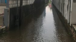 Genangan air bah yang merendam akses jalan raya dan sejumlah bangunan rumah warga akibat tingginya curah hujan di wilayah Kabupaten Kotawaringin